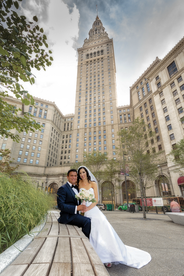 Nicole and Malcolm with Cleveland architecture behind them