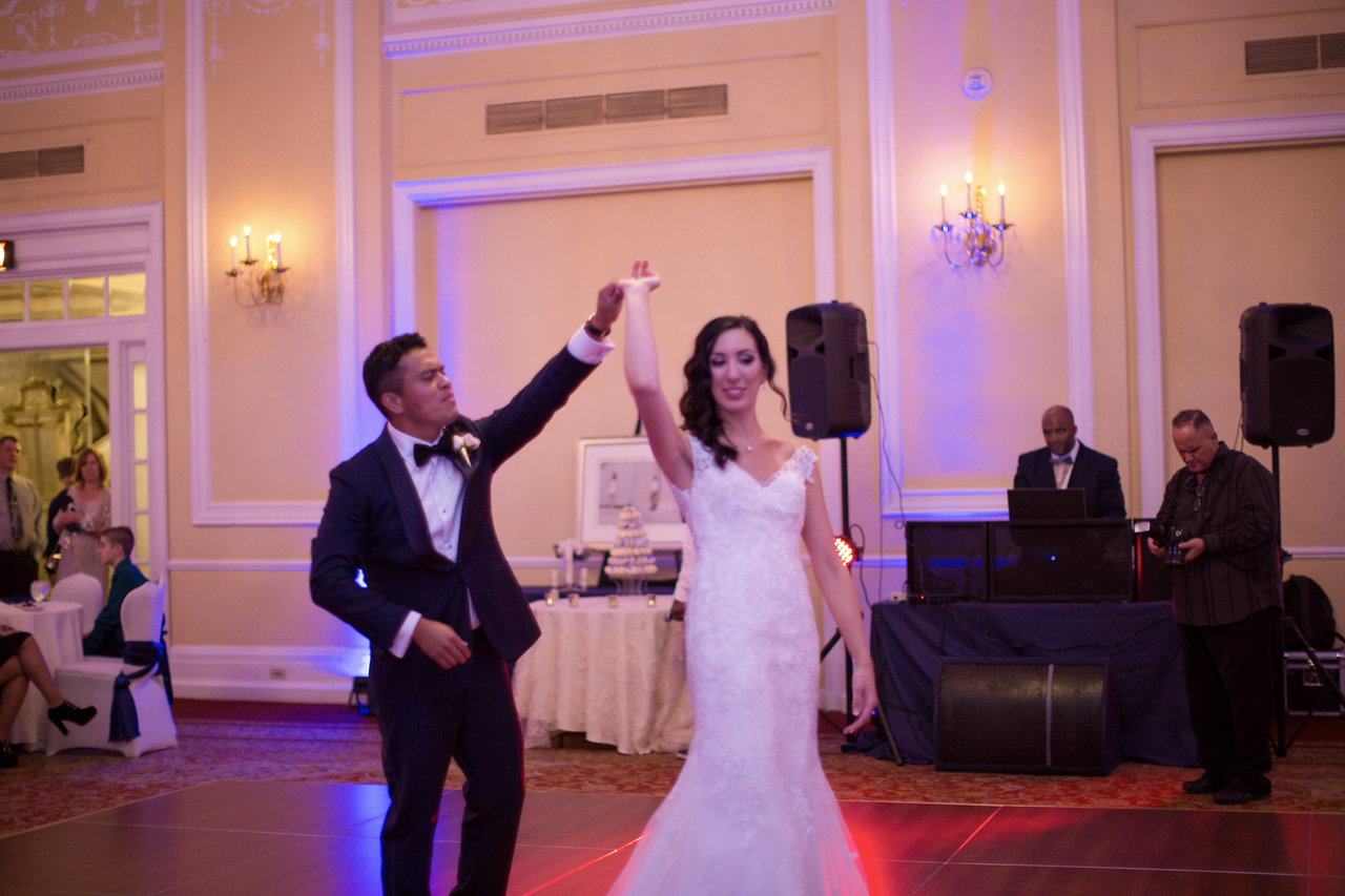Malcolm twirling Nicole on the dance floor