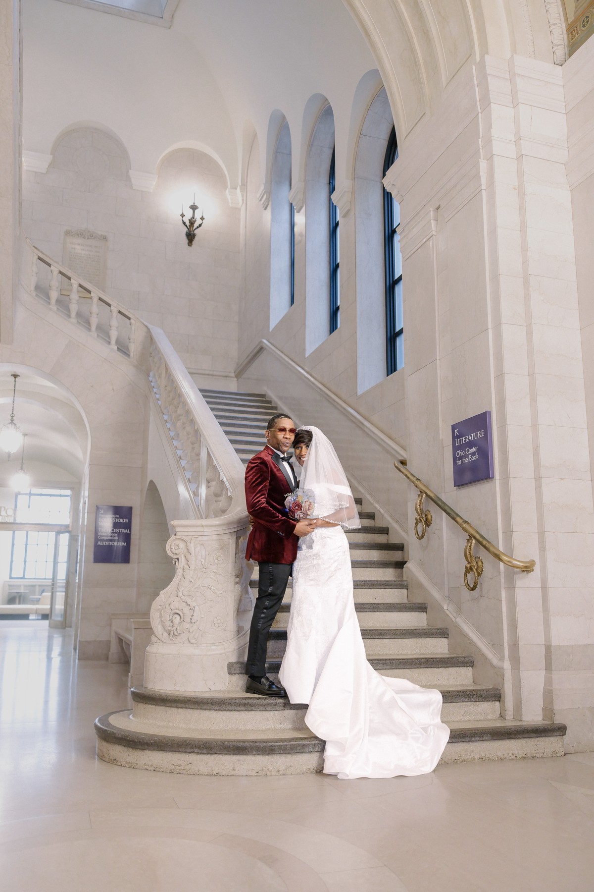 Wedding portrait of Yolanda and Ron on the library staircase